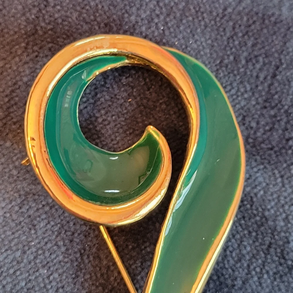 Trifari trio brooches